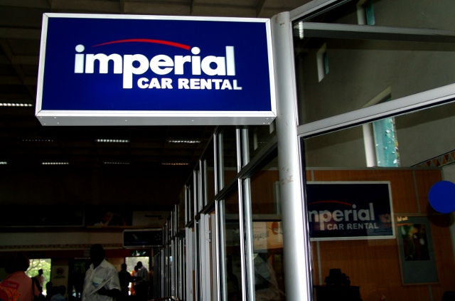 Imperial Car Rental sign at Livingstone Airport, international arrivals