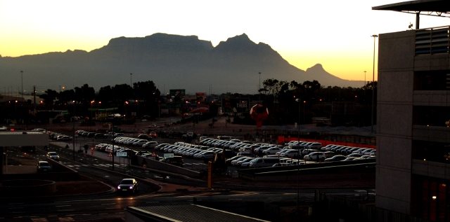 Cape Town International Airport at dusk with Table Mountain in the background