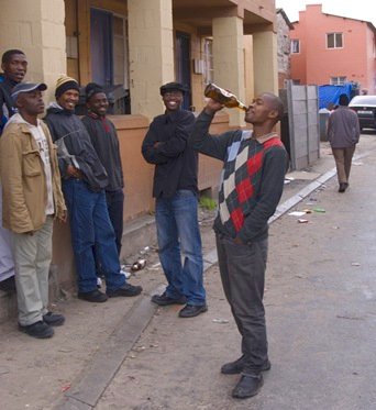 man drinking beer in Langa