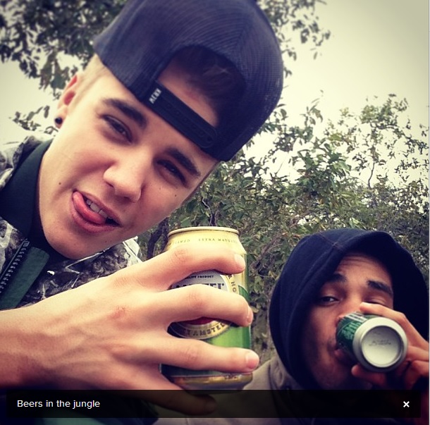 Justin Bieber drinking a beer