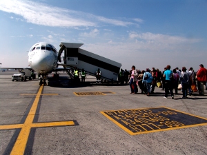 passengers board a 1time MD80 at Cape Town Airport