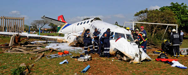 rescue workers at the downed Airlink flight 8911