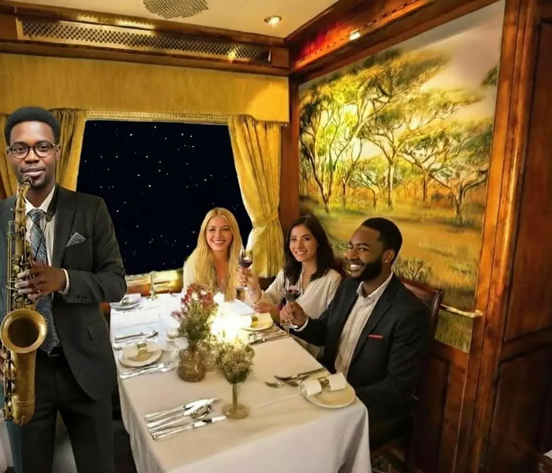 Jazz player on The Blue Train at a dinner table